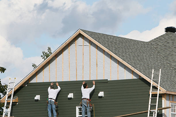 Professional Siding technician working in Danville, VA